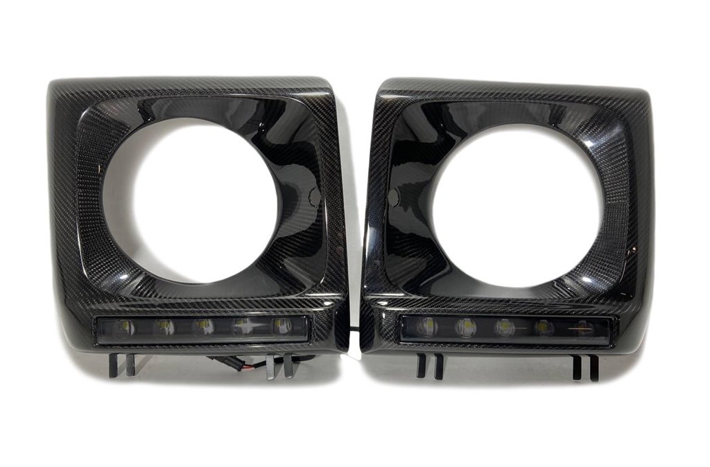 Kohlefaser Frontscheinwerferblenden mit LEDs Set für Mercedes-Benz W463 G-Wagon-Körperteile Kohlefaser Frontscheinwerferblenden mit LEDs Set für Mercedes-Benz W463 G-Wagon-Körperteile