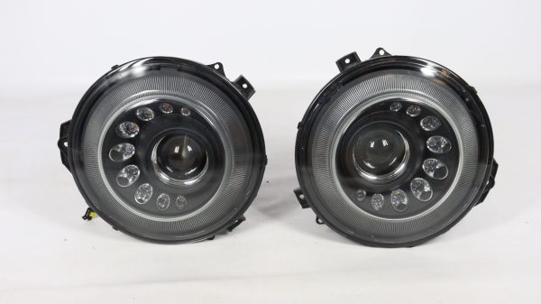 Black Mansory style headlights set for Mercedes-Benz G-Class W463 2007–2018, aggressive front-end upgrade with premium construction