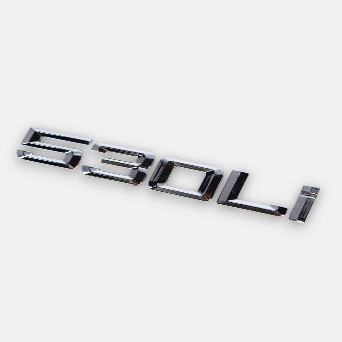 530Li chrome badge