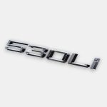 530Li chrome badge