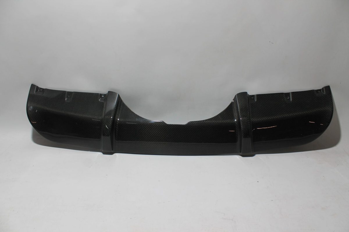 overhead studio shot of complete carbon tail diffuser lower valance assembly
