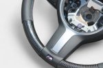 BMW F35 flat bottom carbon steering wheel close-up
