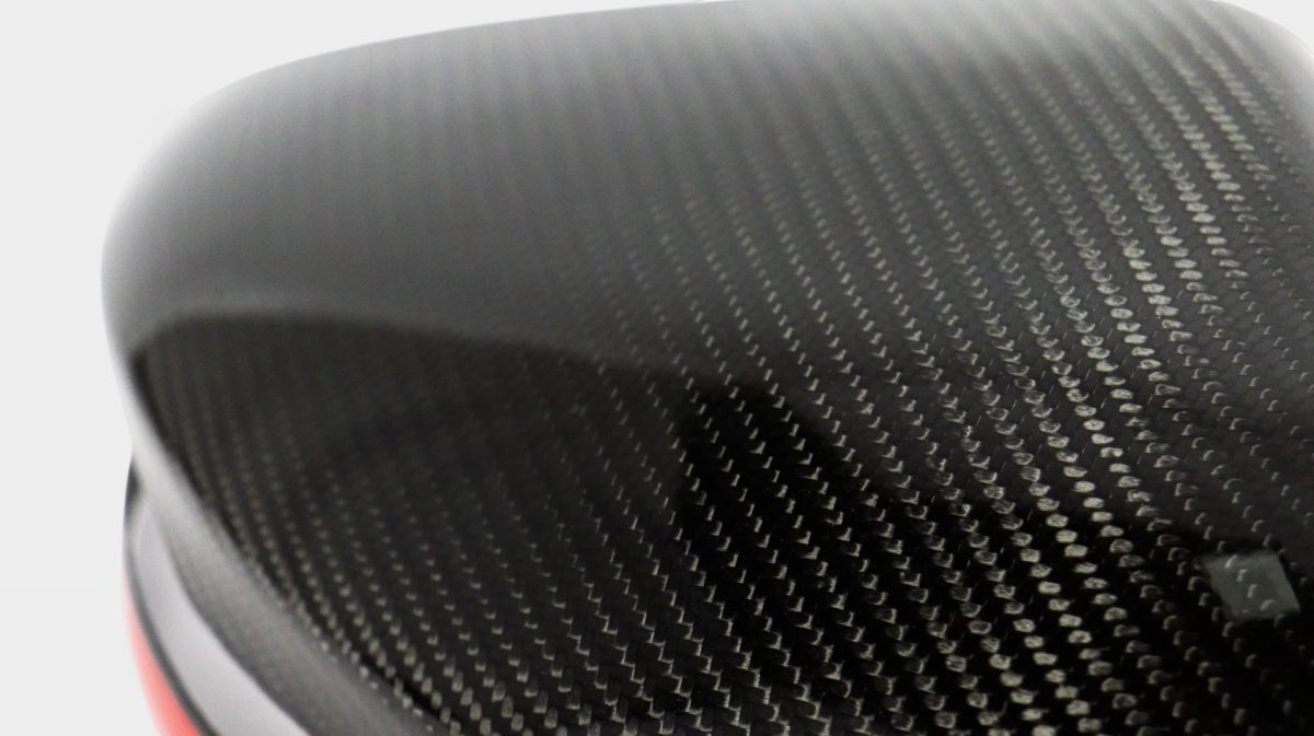 Mercedes G63 AMG carbon mirror covers red stripe close-up