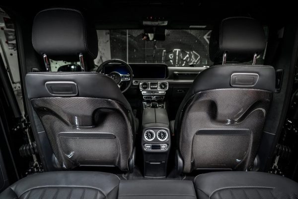 Close-up of gloss grey carbon rear seat covers for Mercedes G-Class