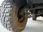 Detailed shot of aggressive tread design on 37-inch off-road tire with Kubay Design rim.
