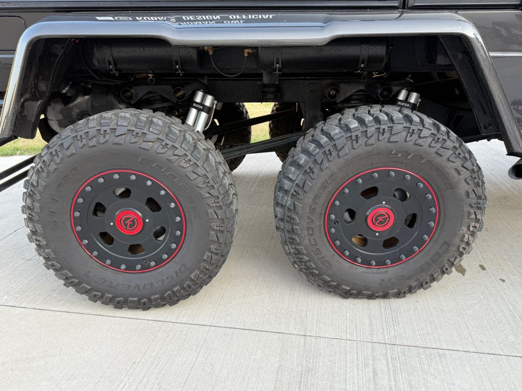 Side view of dual 37-inch off-road tires mounted on Mercedes-Benz W463 6×6.
