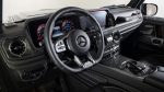 Mercedes-Benz G-Class W463A carbon fiber dashboard and console trim – glossy OEM-style finish.