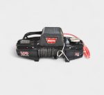 Front view of uninstalled black WARN electric recovery winch unit with synthetic rope, control box, and hook