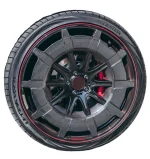 Angled view displaying custom dark wheel rim wrapped in Vredestein rubber with carbon aero cover
