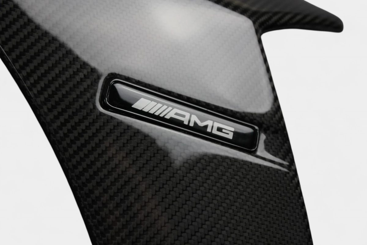 Illuminated carbon fender flaps for S-Class
