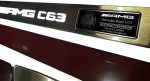 Polished stainless door sill with white illumination – close-up