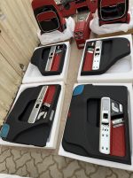 Premium OEM-style interior retrofit kit for Mercedes-Benz G-Class W463 with red leather upholstery and modern dashboard.