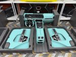 Mercedes-Benz G-Class W463 interior parts set with seats, dashboard, multimedia display, wiring harnesses, and accessories.