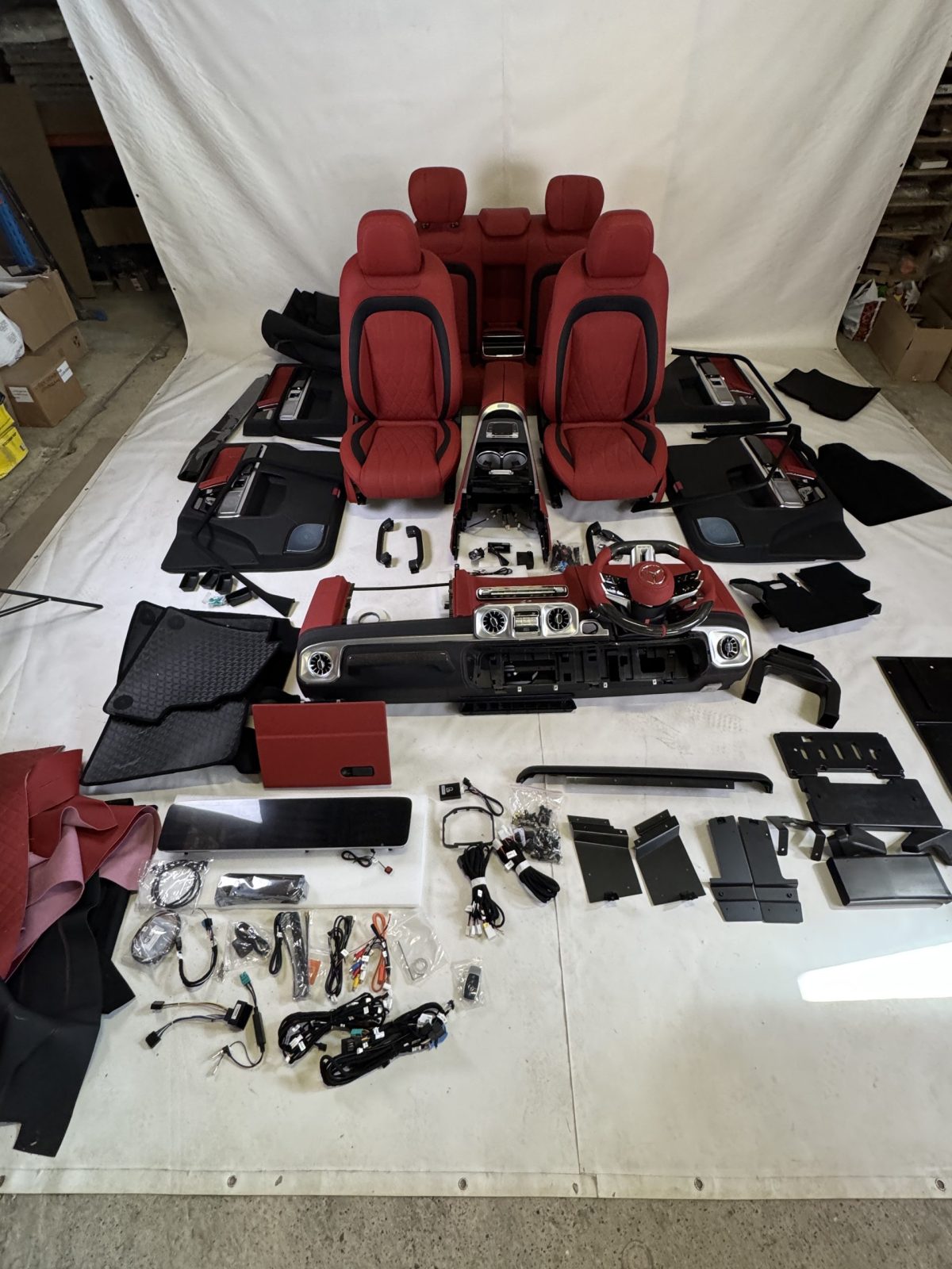 Premium W465 Style interior conversion kit for Mercedes-Benz G-Class W463 with complete factory-style components.