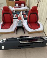 Complete W465 style interior upgrade for Mercedes-Benz G-Class W463 including dashboard, AMG steering wheel, digital display, and red leather seats.