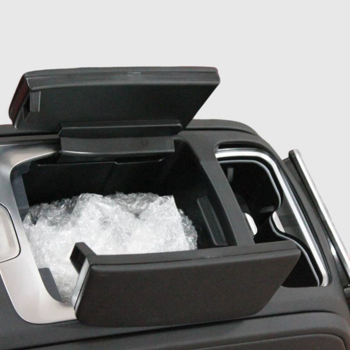 Mercedes V-Class center console with integrated touchscreen controller, chrome cup holders, and compressor cooler