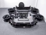 Rocket Style carbon fiber widebody kit for Mercedes-Benz G-Class W465 laid out on the floor
