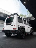 Flush carbon fiber rear tailgate spare wheel delete panel with backlit illuminated logo for W465