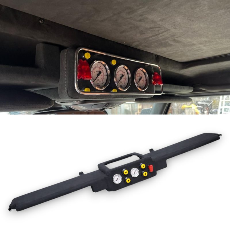 Alcantara-wrapped CTIS roof console with dual pressure gauges.