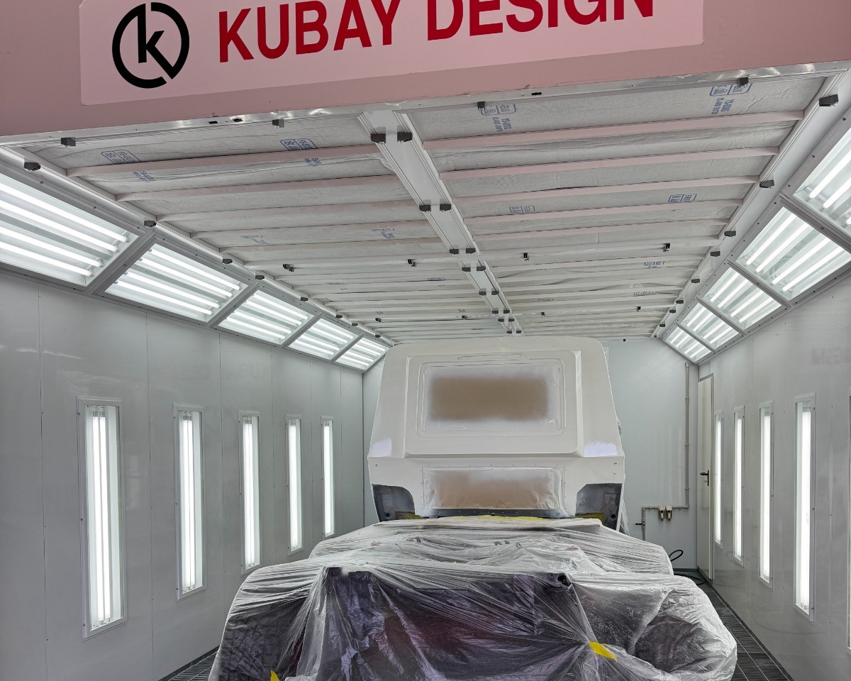 Wide view of the Mercedes G-Class 6x6 body inside the Kubay Design paint booth, 2022 build
