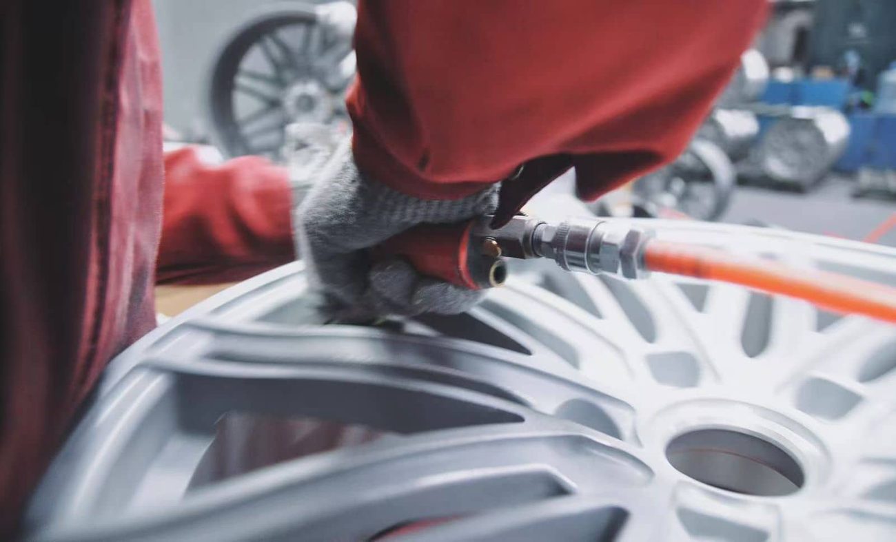 Forged wheel manufacturing facility with finished custom rims