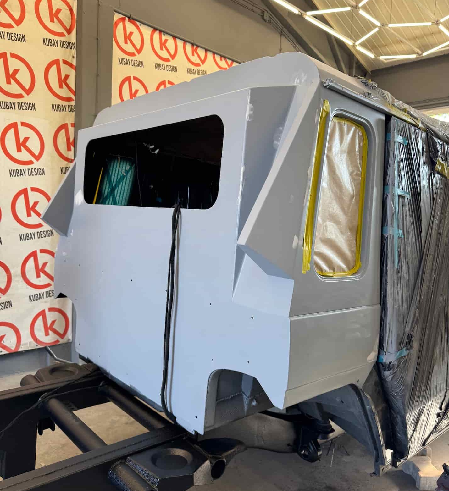 Primered ONYX Mercedes G-Class 6x6 cab and rear body section ready for paint