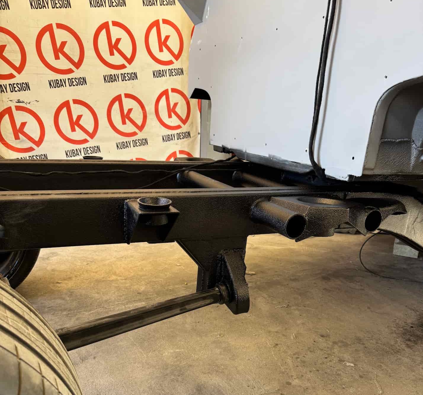 Rear frame extension and exhaust routing on the ONYX Mercedes G-Class 6x6 chassis