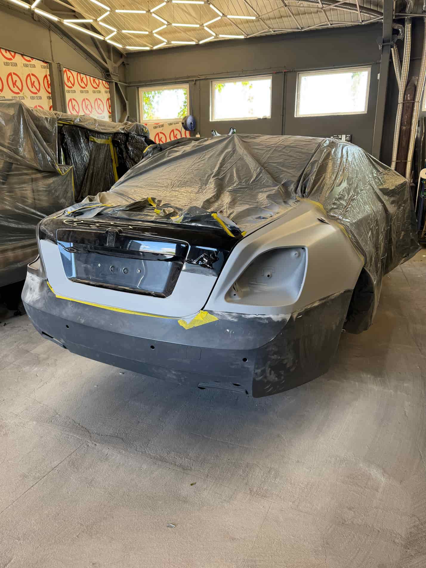 Rear fender welding and bumper replacement on Rolls-Royce Ghost restyling