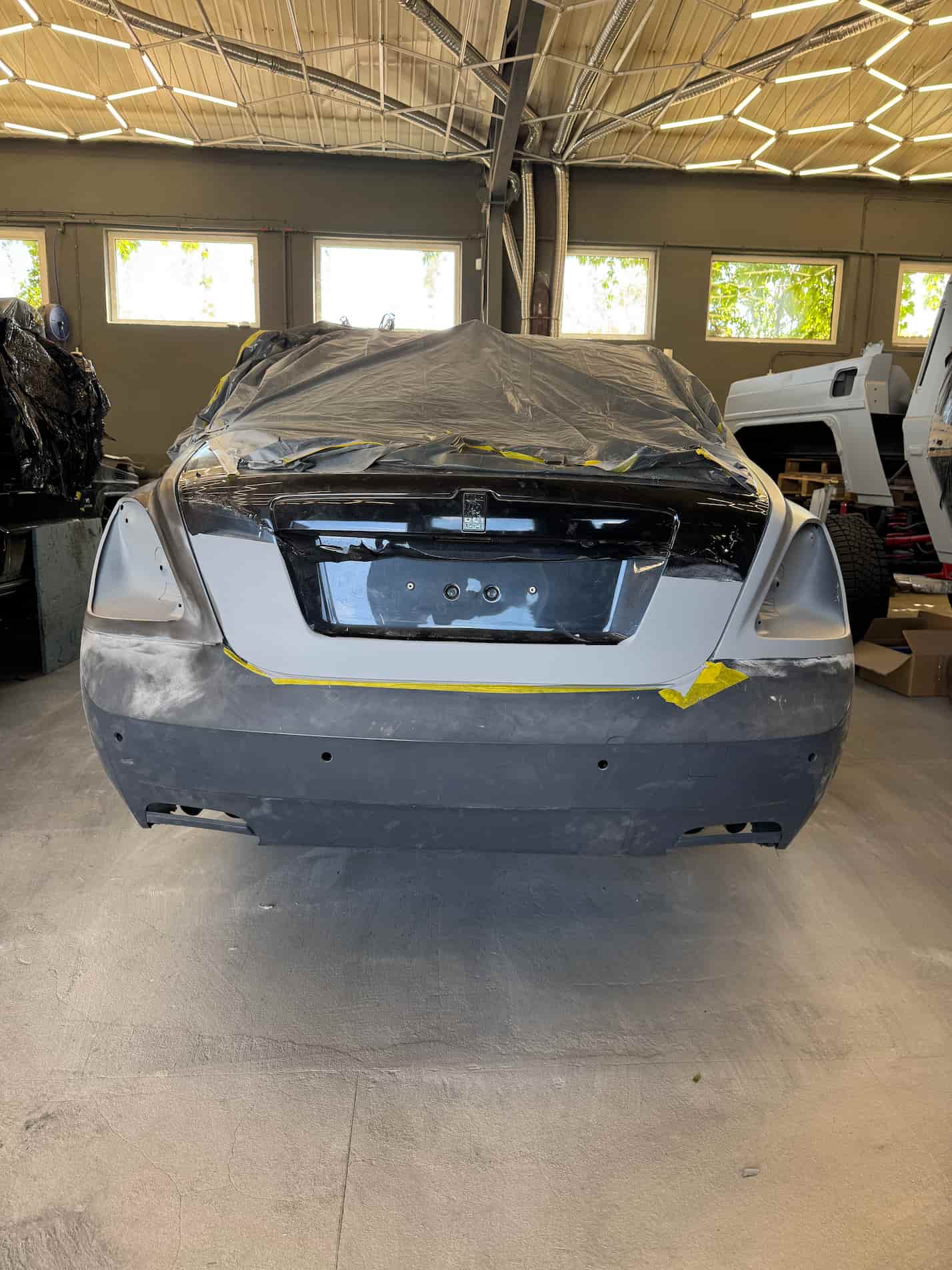Rear fender welding and bumper replacement on Rolls-Royce Ghost restyling