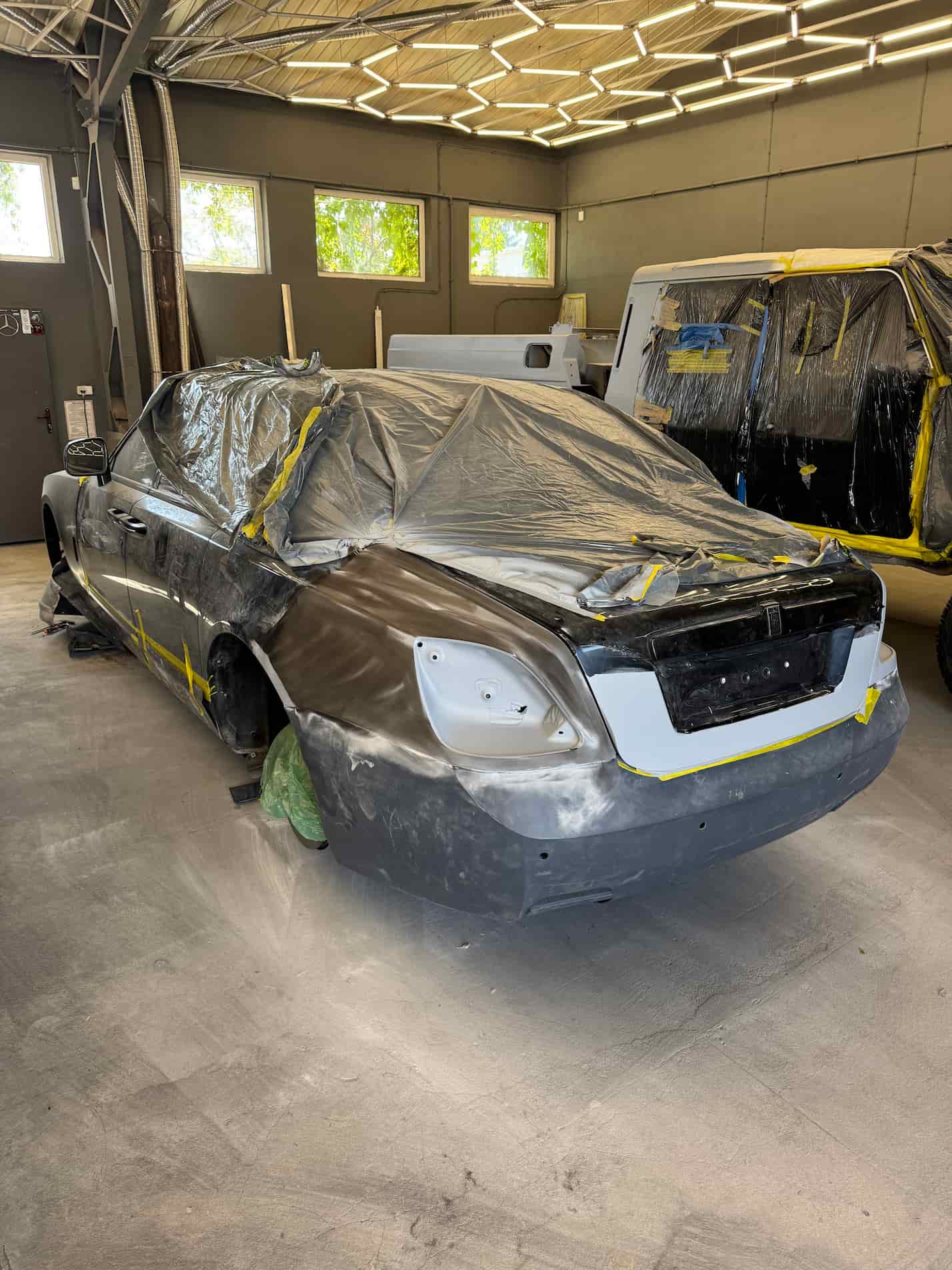 Rear fender welding and bumper replacement on Rolls-Royce Ghost restyling
